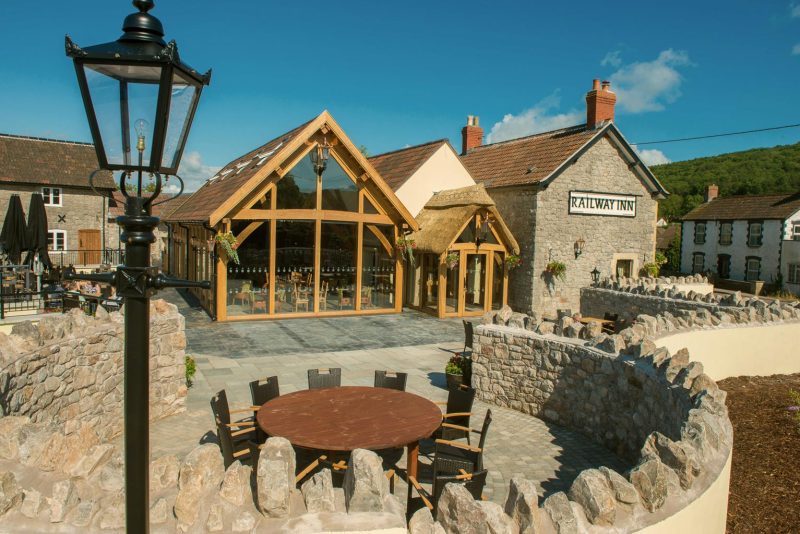 The Railway Inn, a stone-built cottage converted and extended years ago into a village pub, now owned by Thatchers Cider.
